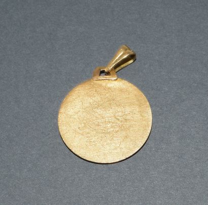 MEDAL in 18k (750/°°) yellow gold depicting...
