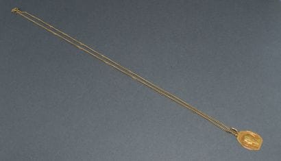 MEDAL in 18k (750/°°) yellow gold with the...