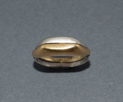 Lot of 2 tangled rings in 18k yellow gold...