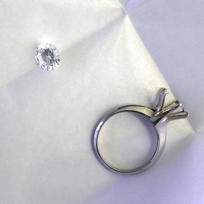 SOLITAIRE RING in platinum set with a 1.52...