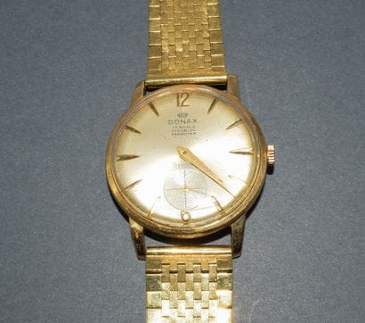 BRACELET WATCH in 18k (750/°°) yellow gold...