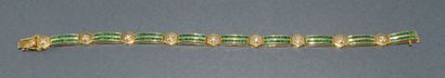 BRACELET in 18k (750/°°) yellow gold adorned...