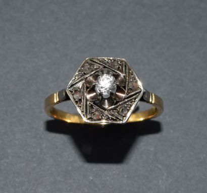 18k (750/°°) yellow gold and silver ring...