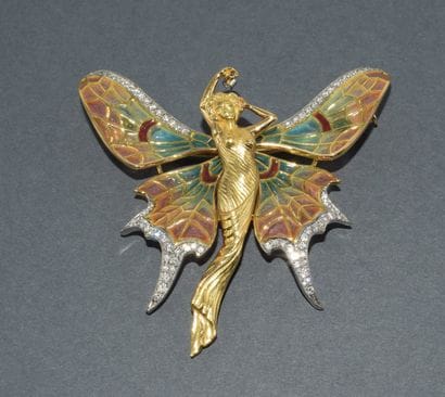 18k (750/°°) yellow gold and platinum brooch...