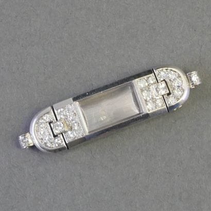 WATCH CASE in platinum set with diamonds....