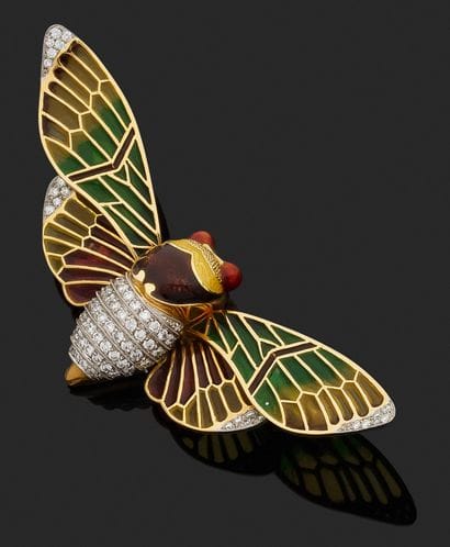 18k (750/°°) yellow gold and platinum brooch...