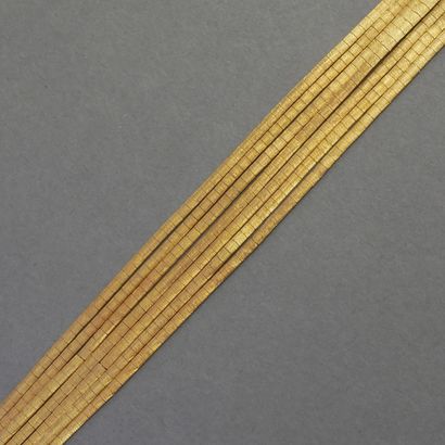 18k (750/°°) yellow gold omega-mesh multi-strand...