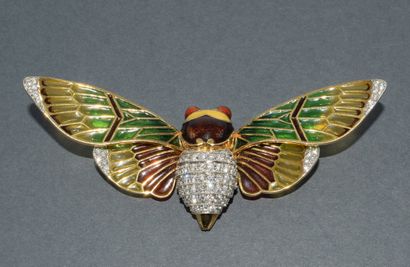 18k (750/°°) yellow gold and platinum brooch...