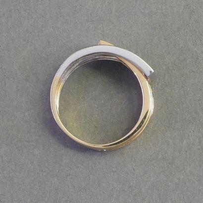 18k (750/°°) yellow and white gold CROSSED...