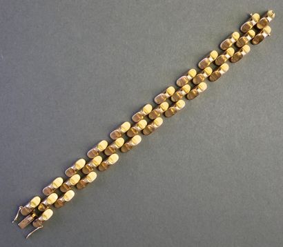 BRACELET TANK articulated in 18k (750/°°)...
