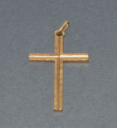 CROSS PENDANT in 18k (750/°°) yellow gold,...