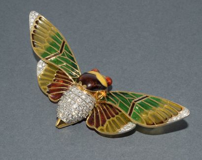 18k (750/°°) yellow gold and platinum brooch...