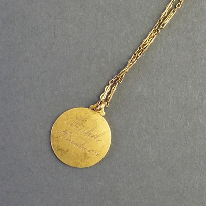 MEDAL AND CHAIN in 18k (750/°°) yellow gold,...