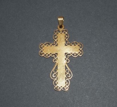CROSS PENDANT in 18k (750/°°) yellow gold...