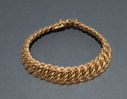BRACELET in 18k (750/°°) yellow gold, American...