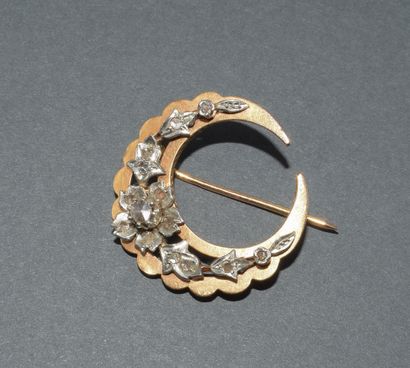 18k (750/°°) yellow gold and silver moon...