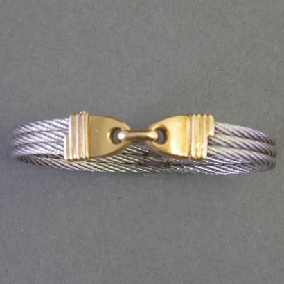 SEMI-RIGID opening BRACELET in twisted steel...