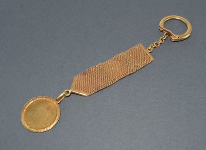 18k (750/°°) yellow gold KEY HOLDER holding...