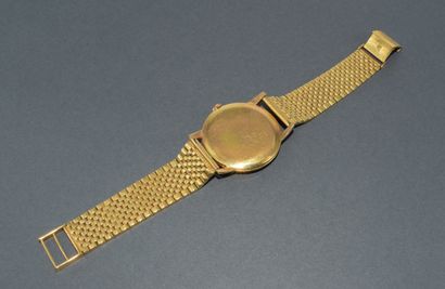 BRACELET WATCH in 18k (750/°°) yellow gold...