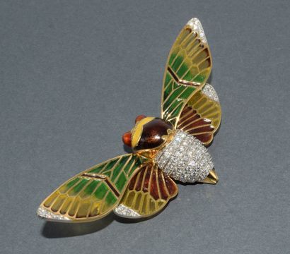 18k (750/°°) yellow gold and platinum brooch...