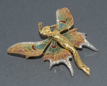 18k (750/°°) yellow gold and platinum brooch...