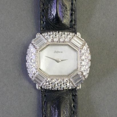 DE LANEAU
BRACELET WATCH in 18k (750/°°)...