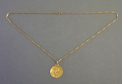 MEDAL AND CHAIN in 18k (750/°°) yellow gold,...