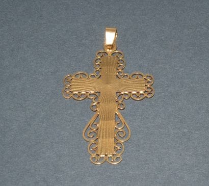 CROSS PENDANT in 18k (750/°°) yellow gold...