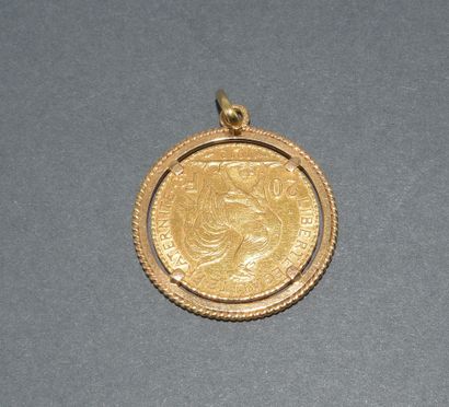18k (750/°°) yellow gold MEDAL set with a...