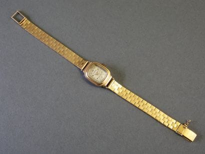 HUMA
WOMEN'S WATCH with an 18k yellow gold...