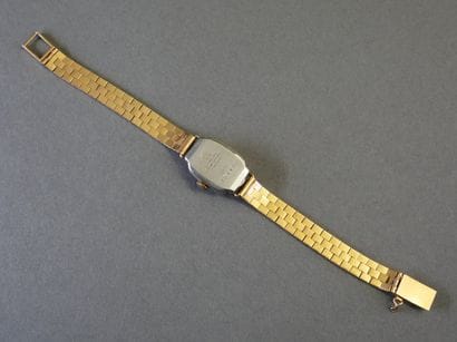 HUMA
WOMEN'S WATCH with an 18k yellow gold...