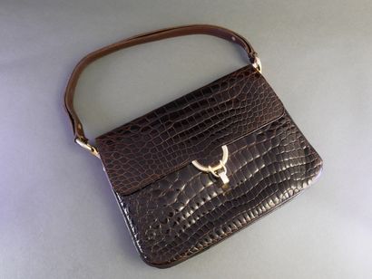 LANCEL
Dark brown crocodile-skin handbag...