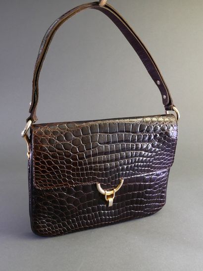 LANCEL
Dark brown crocodile-skin handbag...