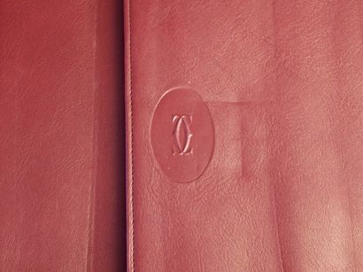 CARTIER
Red leather travel desk set with...