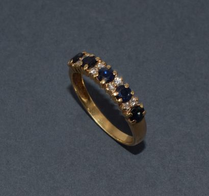 BAGUE DEMI-ALLIANCE en or jaune 18K (750/°°)...