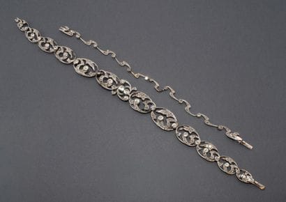 Convertible platinum necklace with a mascaron...