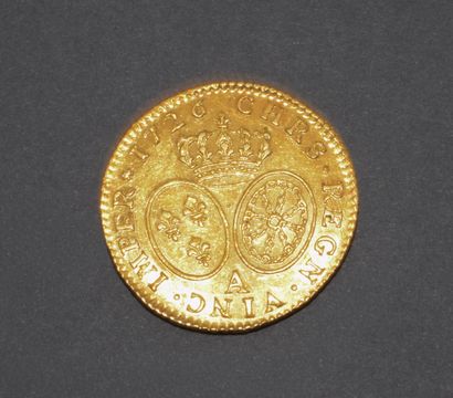 Pièce en or 917/°°
LOUIS XV : Louis d’or...