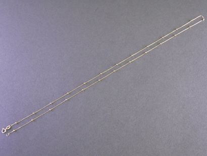 FIN COLLIER en or jaune 18k (750/°°) la chaîne...