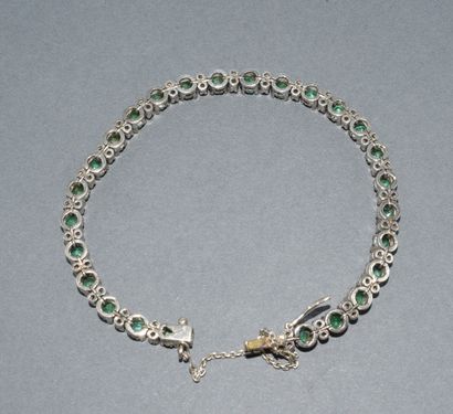 BRACELET RIVIERE en or blanc 18k (750/°°)...