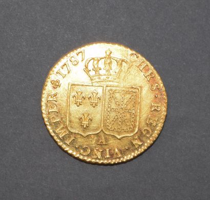 Pièce en or 917/°°
LOUIS XVI : Louis d’or...