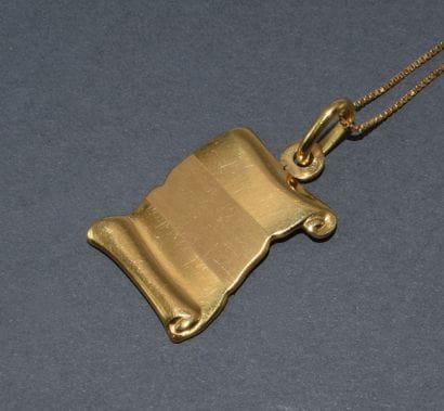 ENSEMBLE en or jaune 18K (750/°°), composé...