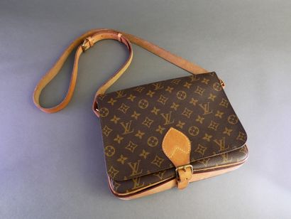 LOUIS VUITTON
21 cm “Cartouchière” bag in...