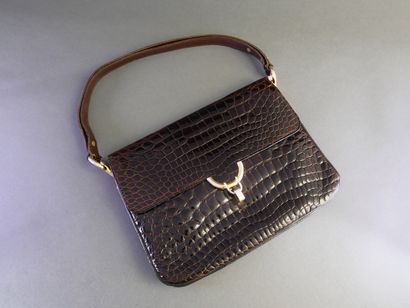 LANCEL
Dark brown crocodile-skin handbag...
