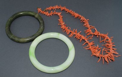 Set of 2 jade bracelets: one light-colored,...