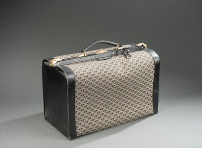 GOYARD
Travel bag made of coated canvas and...