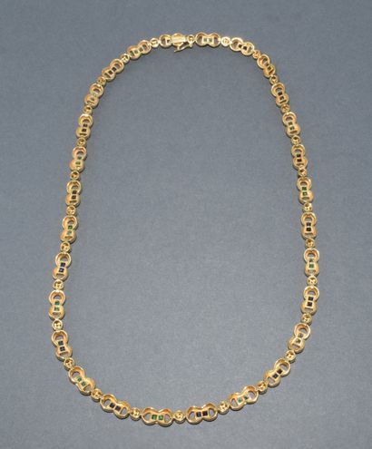 PARURE en or jaune 18k (750/°°) composée...