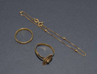Gold set consisting of a BRACELET featuring...