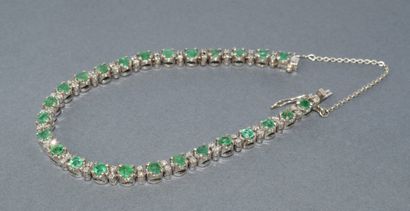 BRACELET RIVIERE en or blanc 18k (750/°°)...