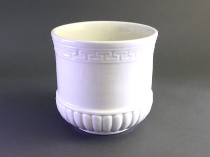 CHRISTIAN DIOR
White porcelain planters.
H....