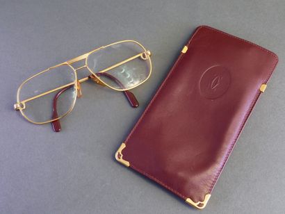 CARTIER
Pair of glasses with gold-tone metal...